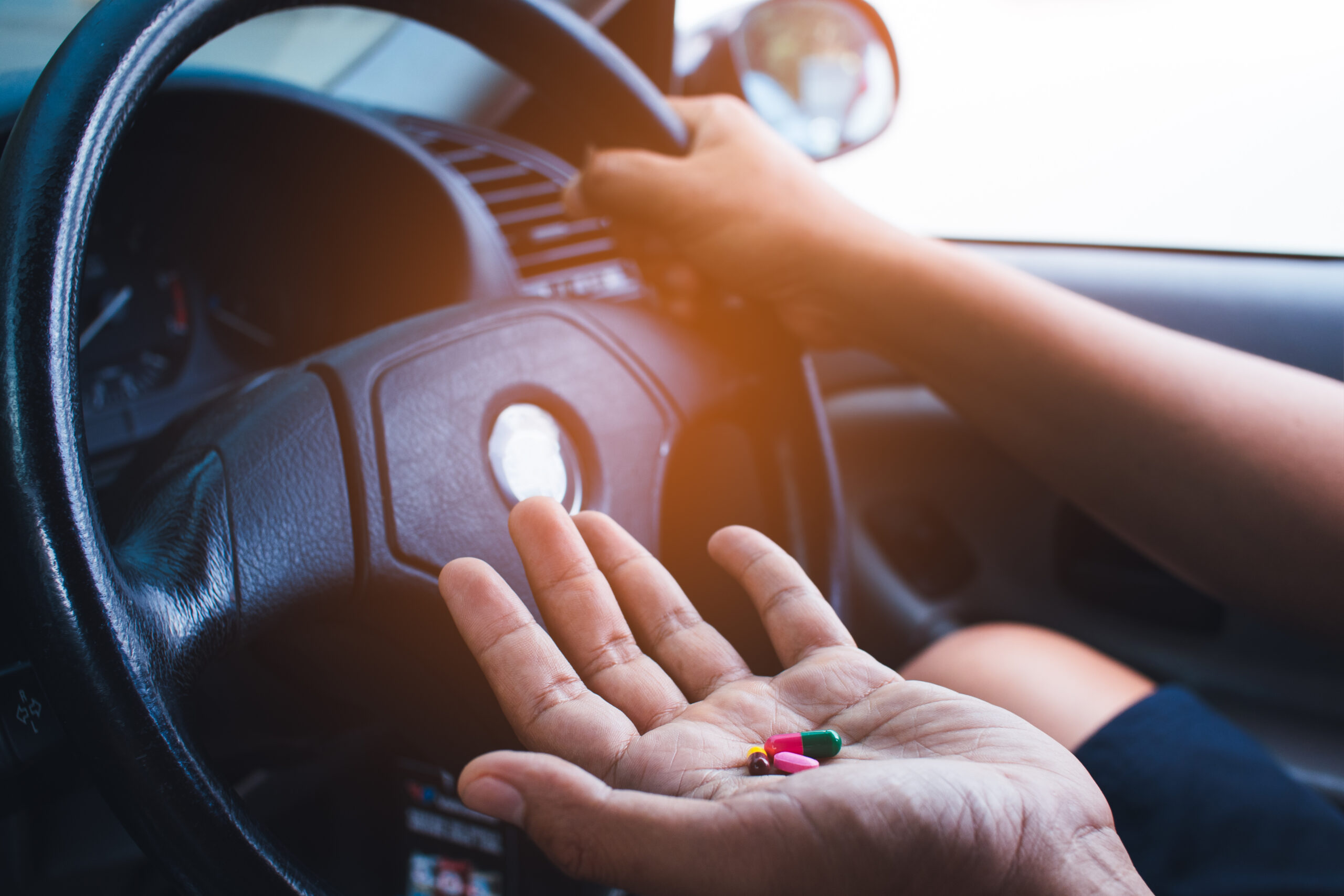Hand of Man takes drugs in the car